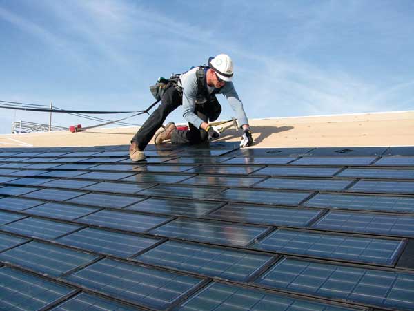 Professional Ironclad Roofs team working on a commercial roof
